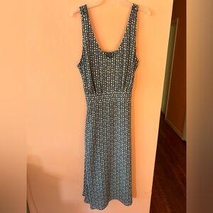 Blue and white polka dot sleeveless midi dress. Tie in back